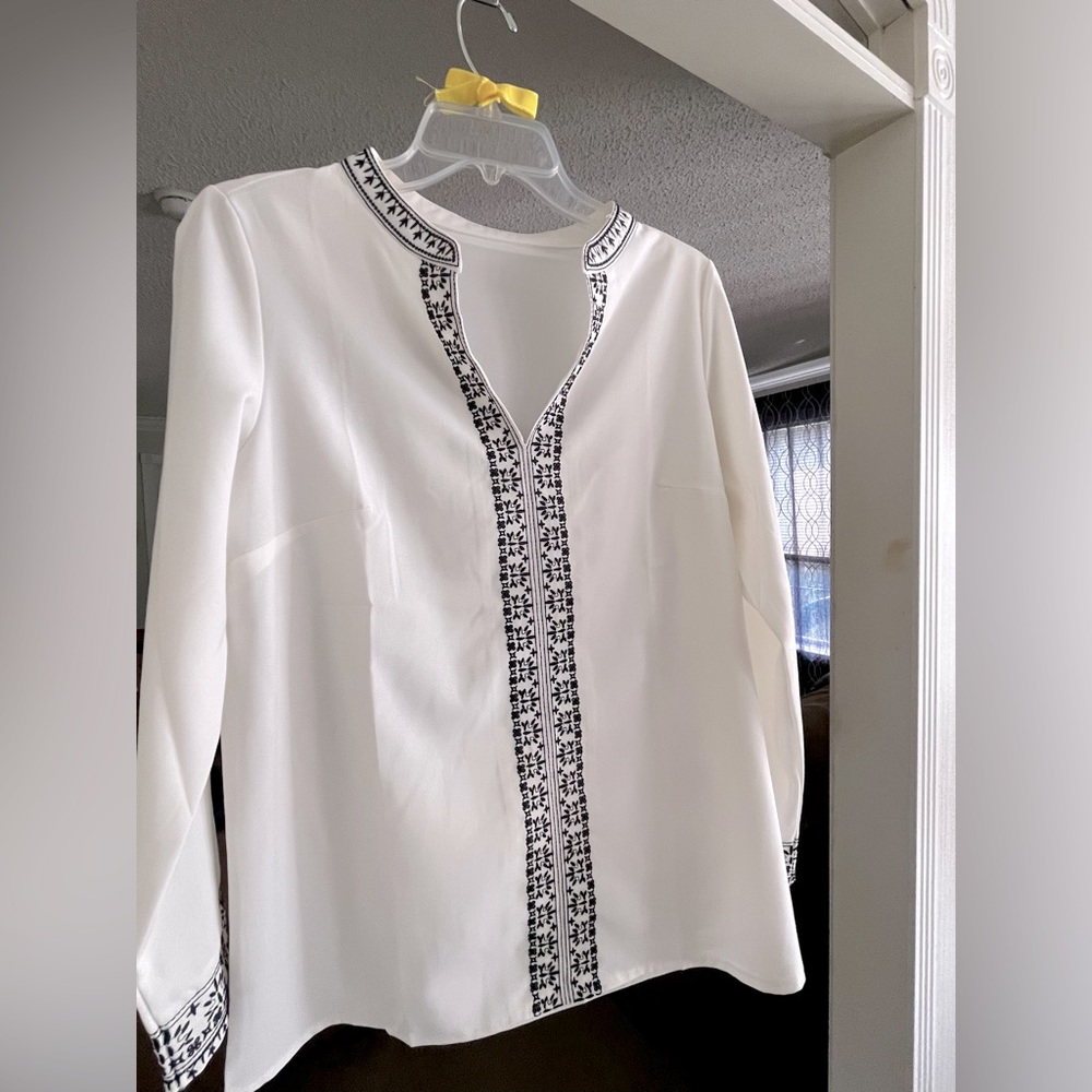 New without tags, tunic top, white with black embroidery. Size S/M